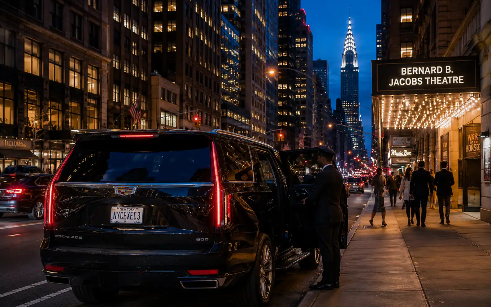 Black car waiting on a lit Manhattan street in the evening